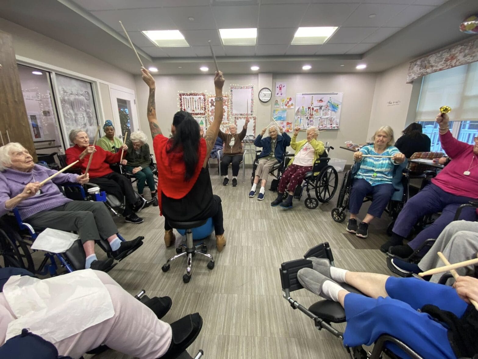 A music therapist leading a group music therapy session