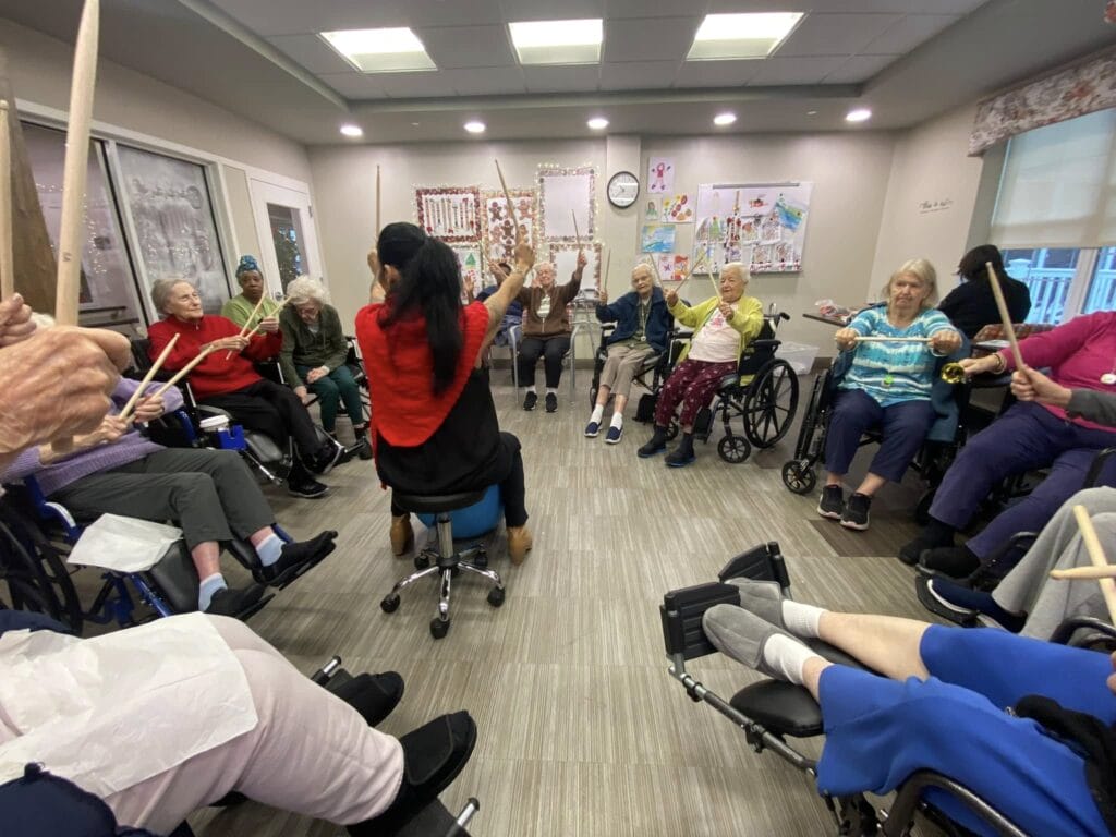 A picture of a music therapy session for seniors