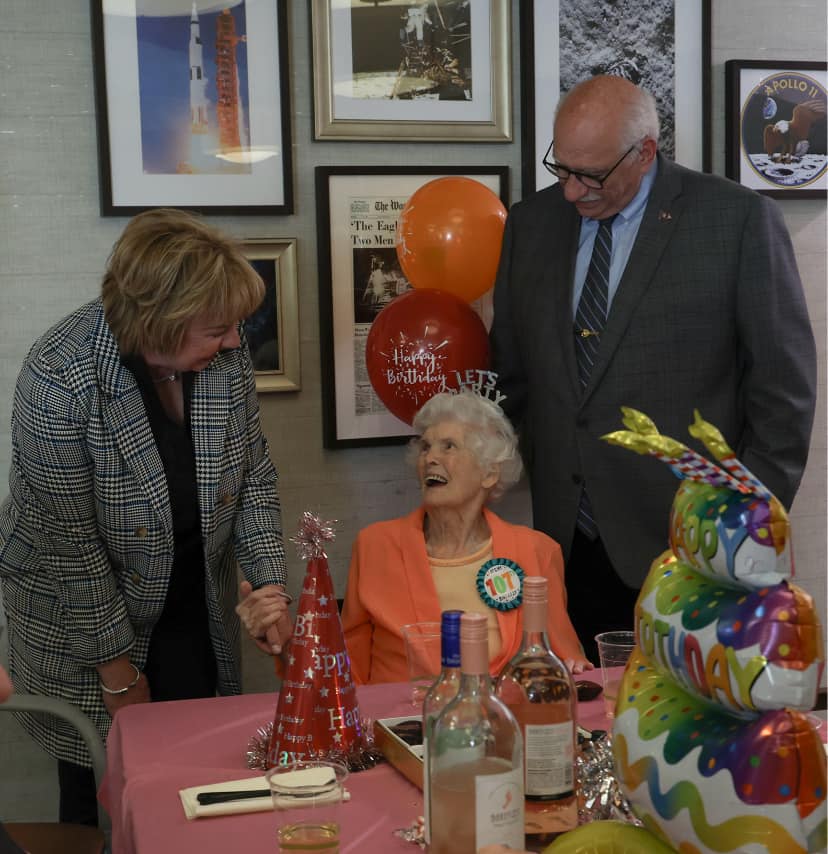 A picture of a woman on her 107th birthday smiling